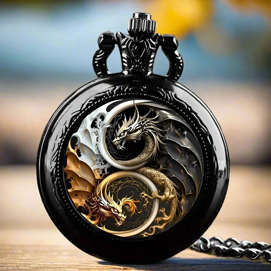 Black pocket watch with intricate gold and silver yin yang dragon design on cover