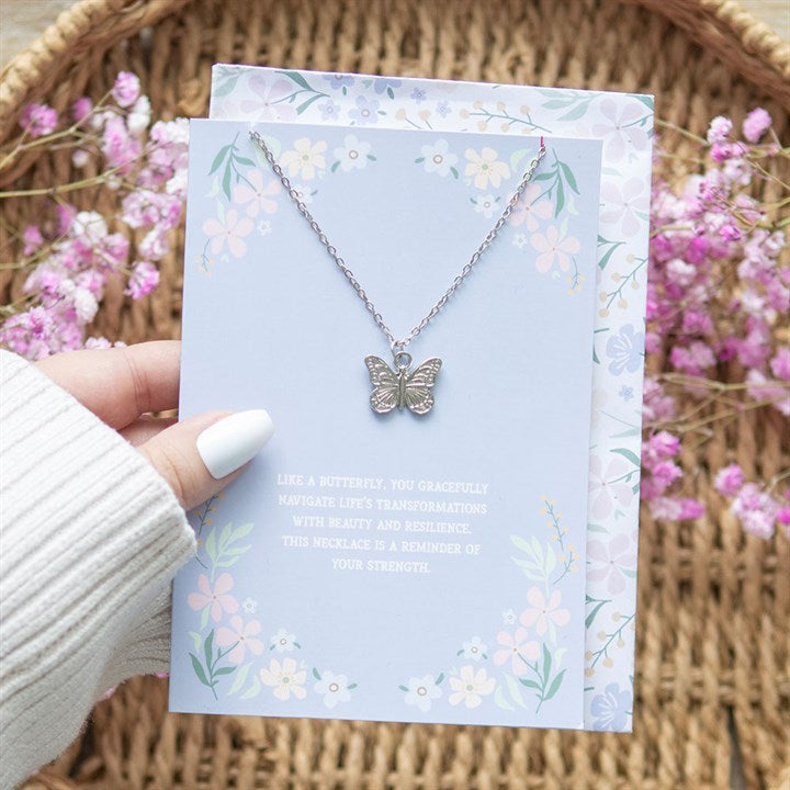 Butterfly necklace on matching greeting card with envelope