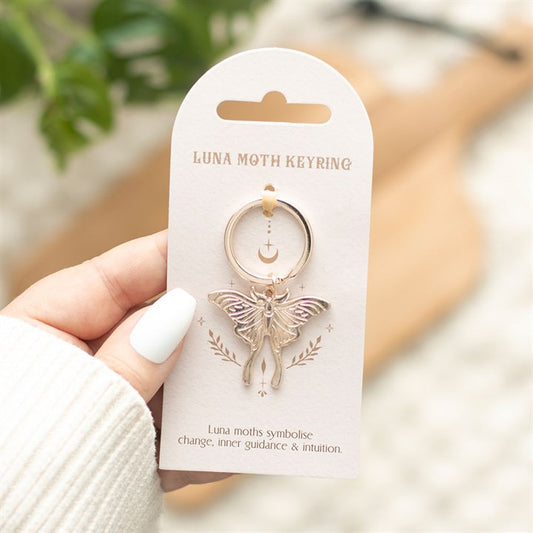 Luna moth metal keyring with symbolic light-tone design
