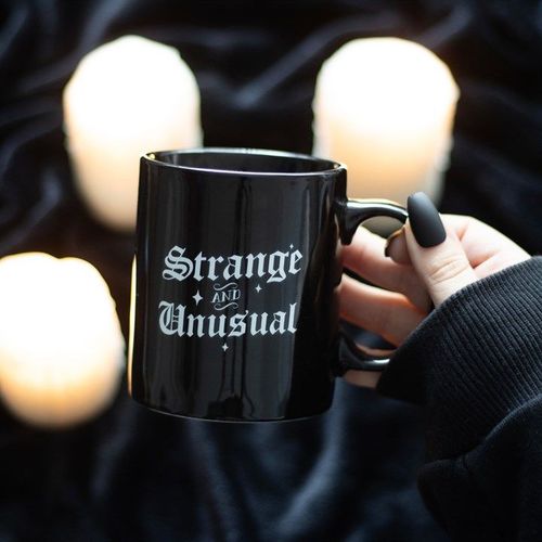 Strange and Unusual ceramic mug with gothic text design