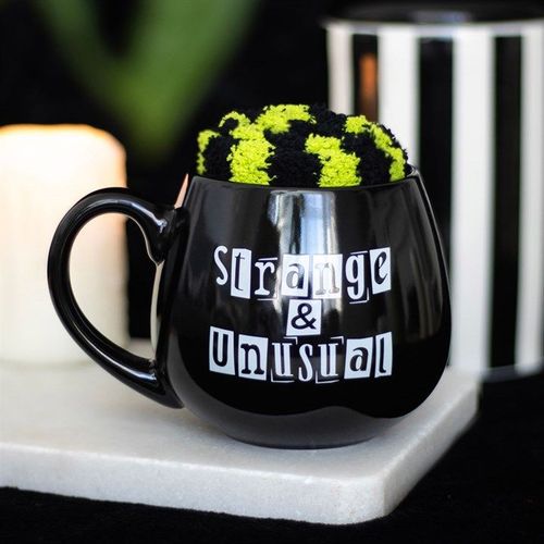 Strange and Unusual mug and socks gift set with bold lettering