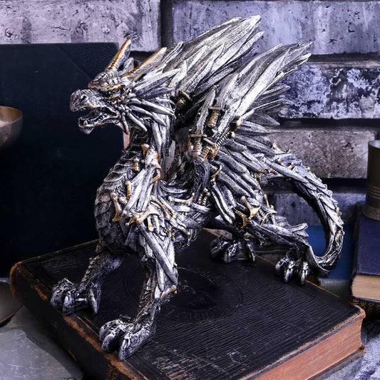 Detailed view of Swordwing silver dragon figurine with golden sword details
