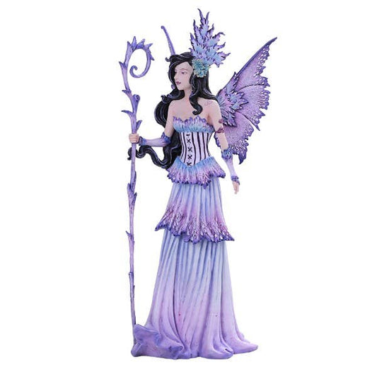 Fantasy fairy figurine with purple dress and wings holding a staff on a white background