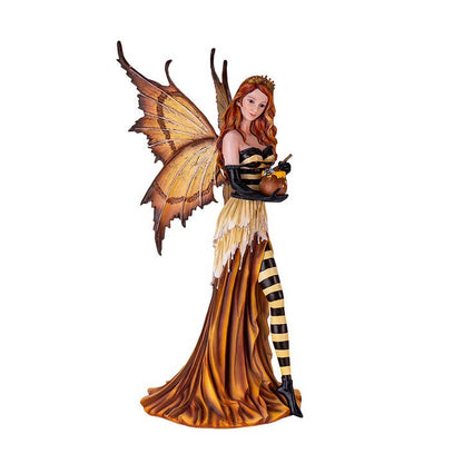 Fantasy fairy figurine with butterfly wings on a white background