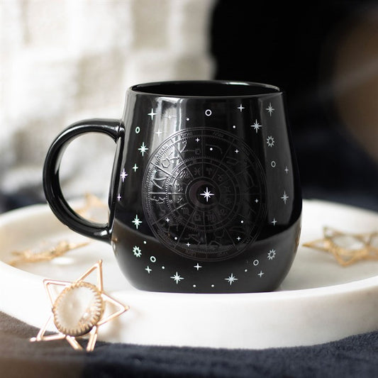 Astrology heat change mug revealing gold wheel and stars
