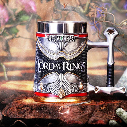 Decorative mug with 'The Lord of the Rings' branding on a wooden surface with a fantasy-themed background.