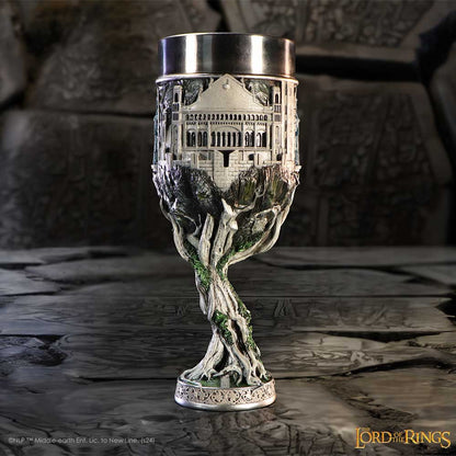 Decorative goblet with a castle design on a stone surface, inspired by 'The Lord of the Rings'.