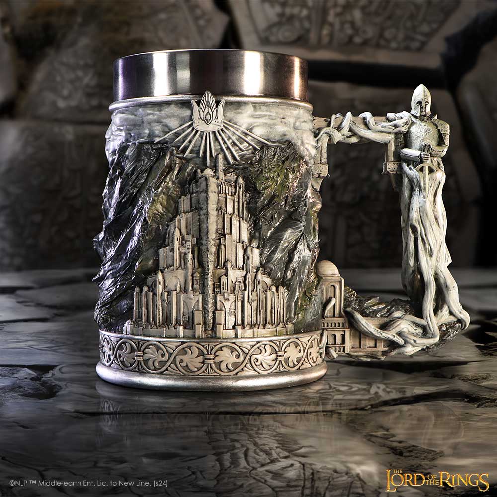 Decorative cup with detailed design of a castle and characters, inspired by 'The Lord of the Rings'.