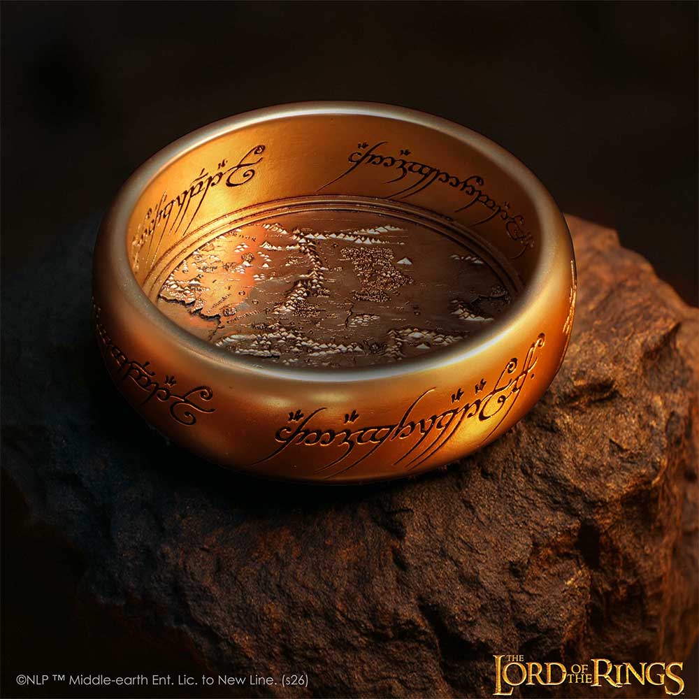 Gold ring with Elvish script on a dark background, featuring 'The Lord of the Rings' branding.