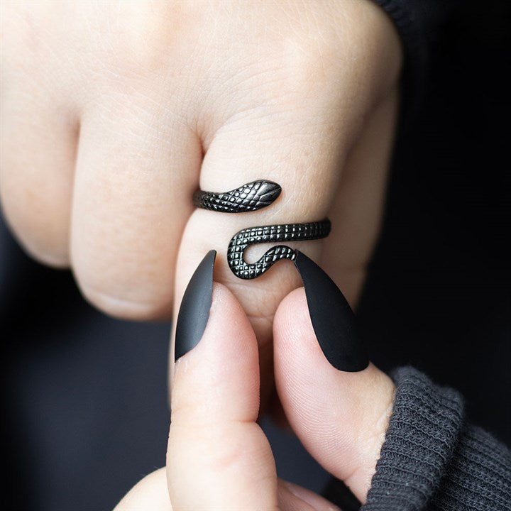 Gothic style adjustable ring shaped like a coiled snake