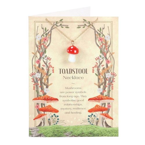 Glass toadstool charm necklace on matching gift card