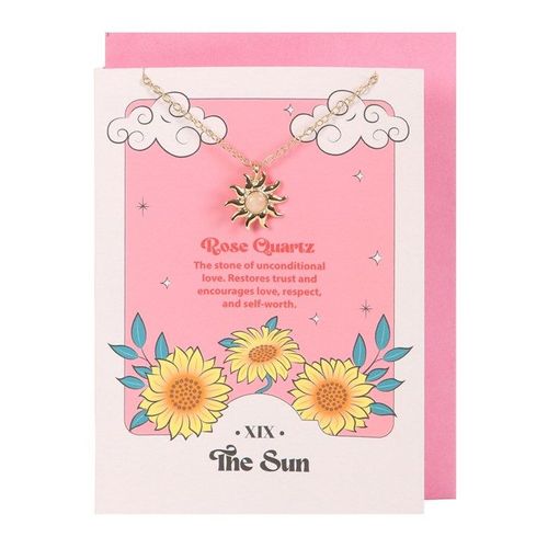 Rose quartz sun necklace on tarot-themed greeting card